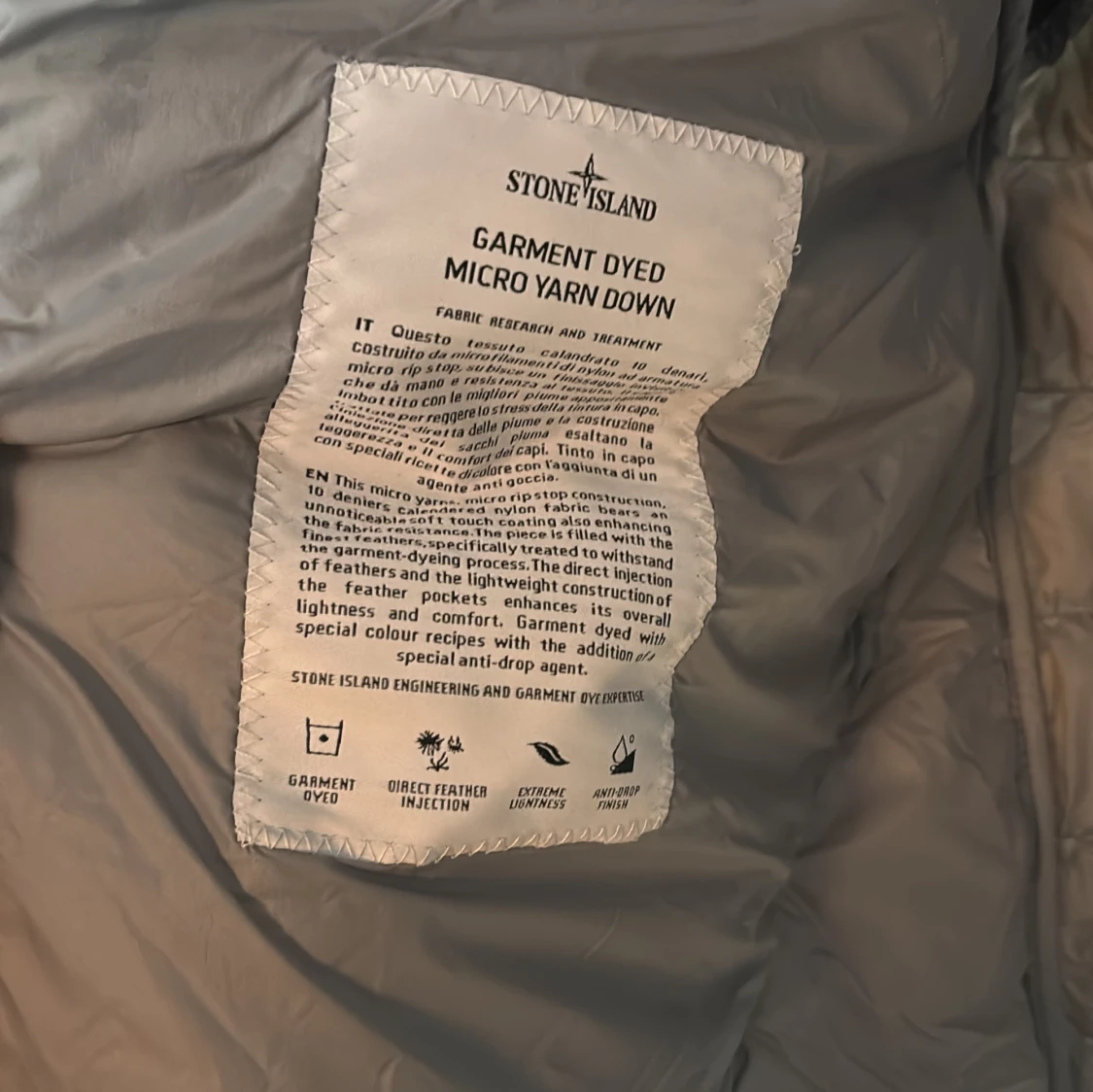 Grå dunväst från Stone Island - 1