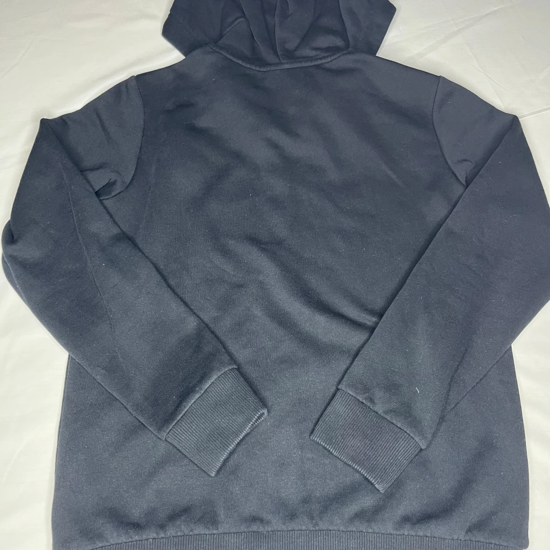 Svart hoodie från Peak Performance - 1