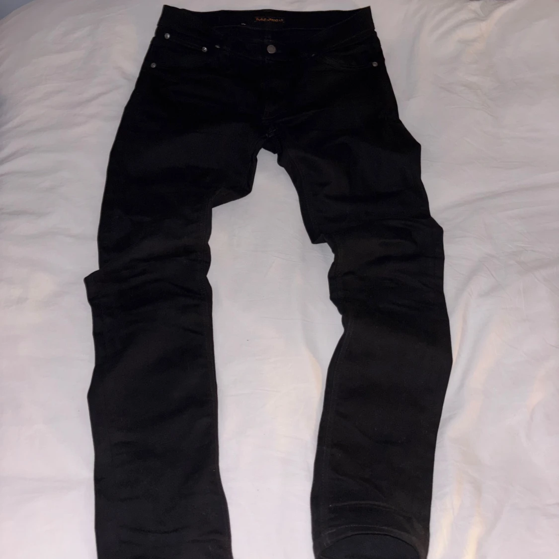 Svarta Nudie Jeans