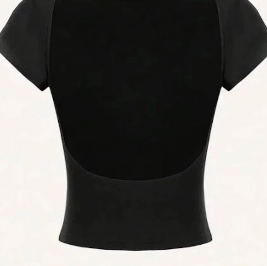 Svart topp med öppen rygg