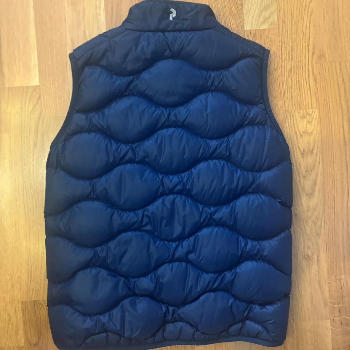 Mörkblå dunväst Peak Performance - 1