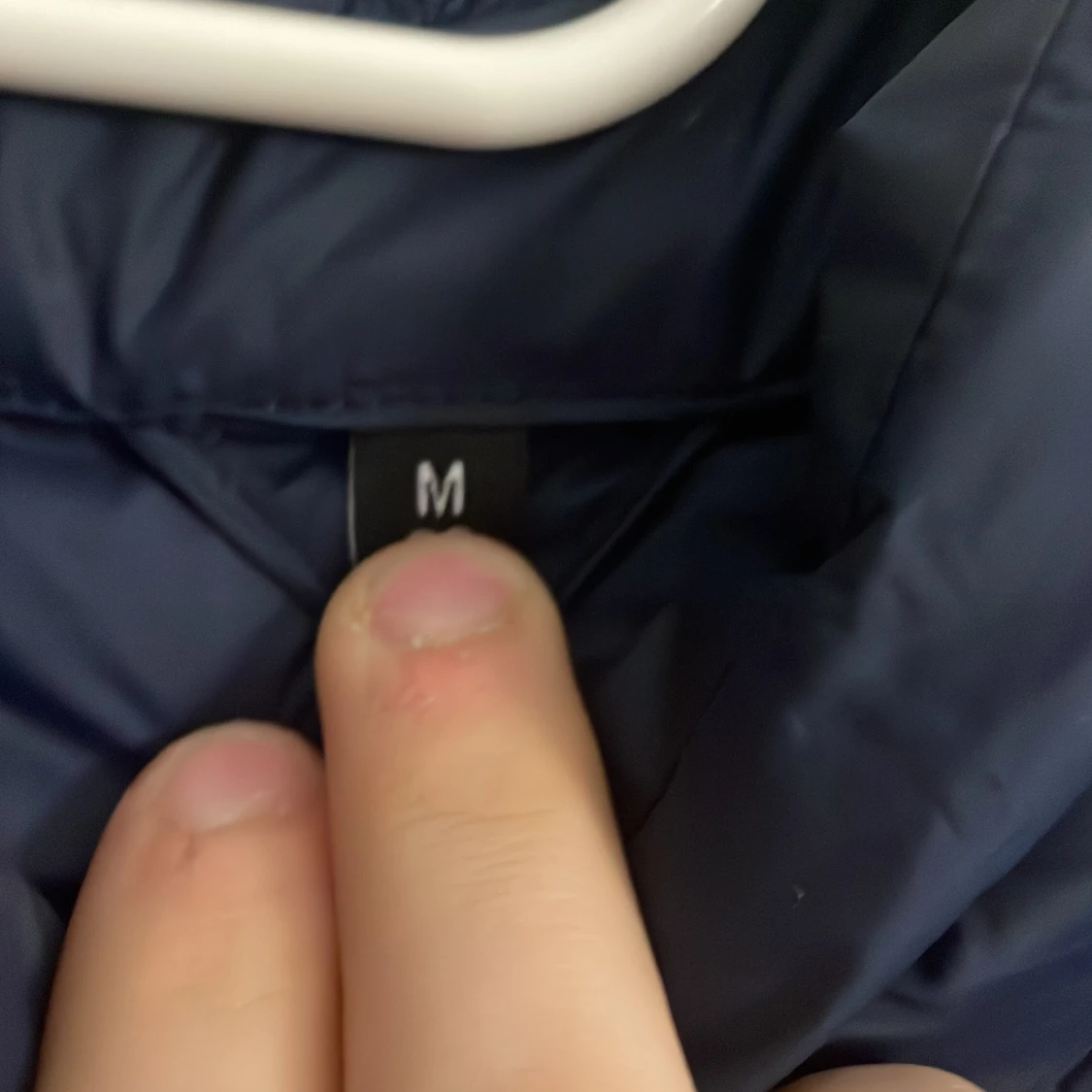 Mörkblå pufferjacka i storlek M - 1