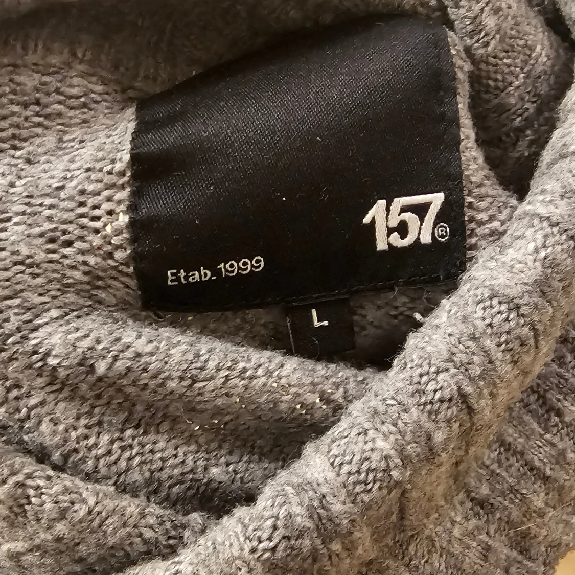 Grå stickad polotröja från 157 - 1