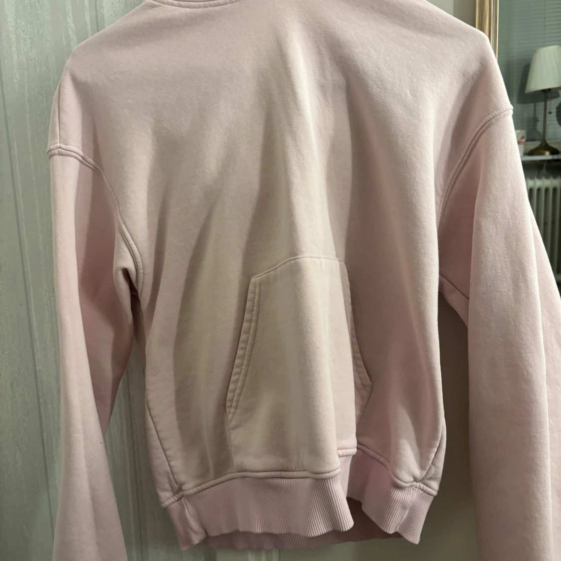 Ljusrosa hoodie från Gina Tricot