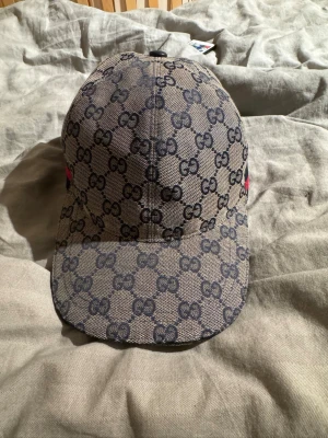 GG Keps - Helt ny, aldrig använd. Storlek M 57cm 