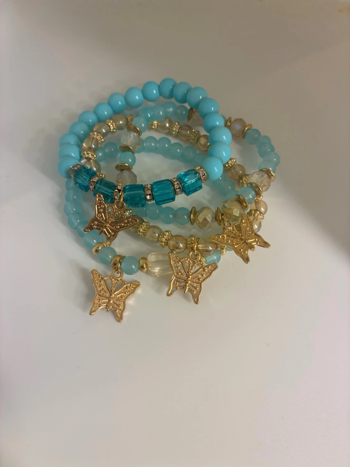 Turkos pärlarmband med fjärilar - 1