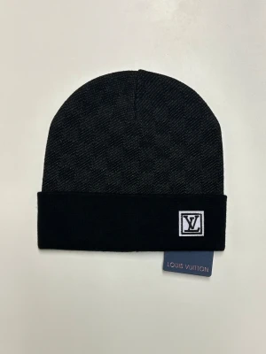 Lv Mössa - Helt ny aldrig använd. Storlek One Size. Snabb frakt.