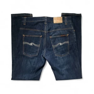 Mörkblå Nudie Jeans - Snygga mörkblå jeans från Nudie Jeans utan defekter | W33 L32 | Pris kan diskuteras vid snabb affär!