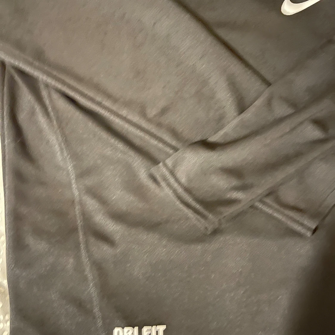 Svart långärmad Nike Dri-Fit tröja - 1