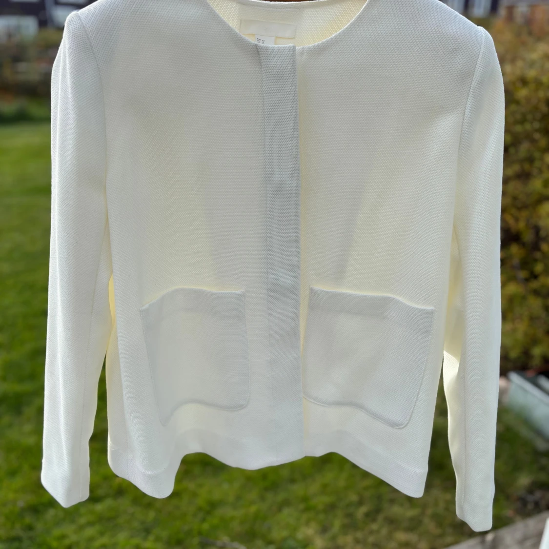 Vit kavaj från H&M, storlek 42