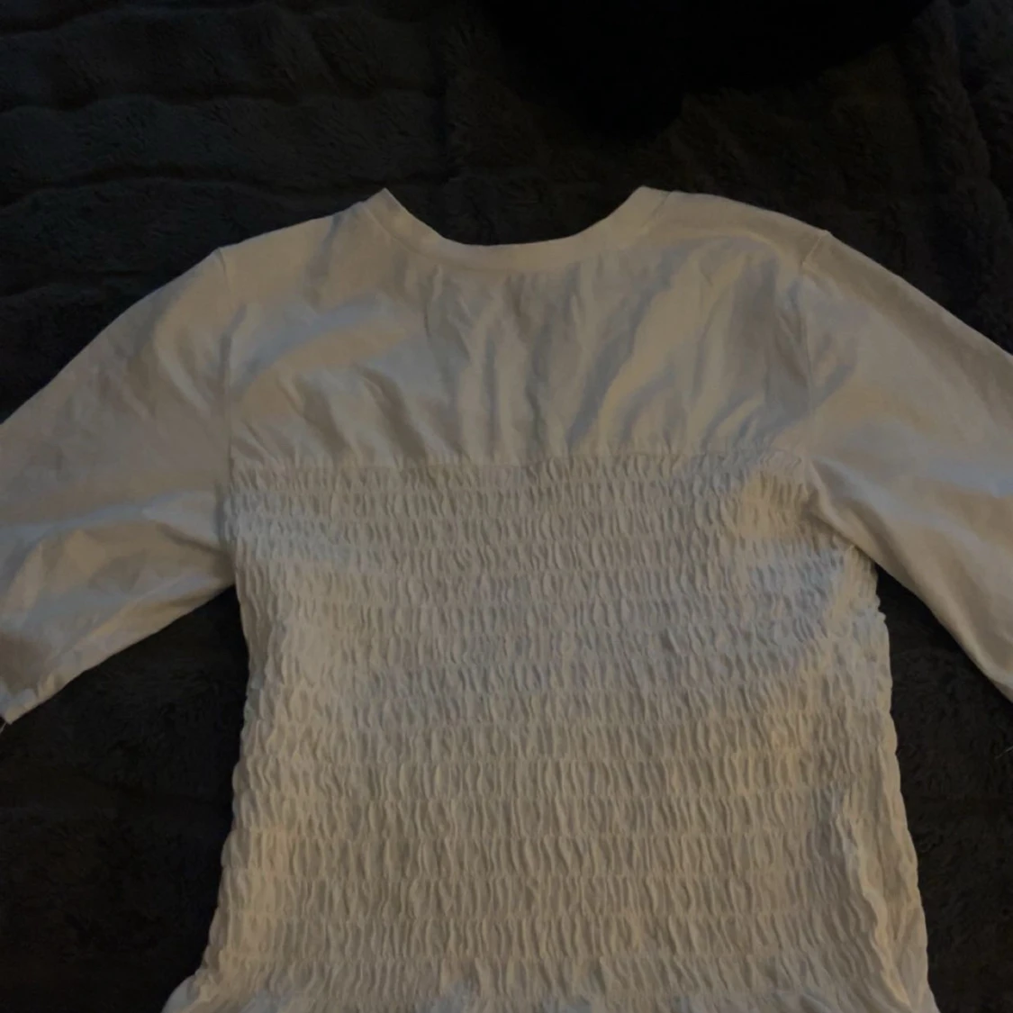 Vit smockad topp från H&M 