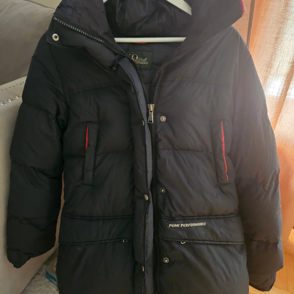 Svart dunjacka Peak Performance