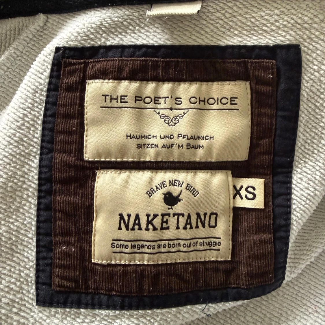 Ljusgrå hoodie från Naketano  - 2