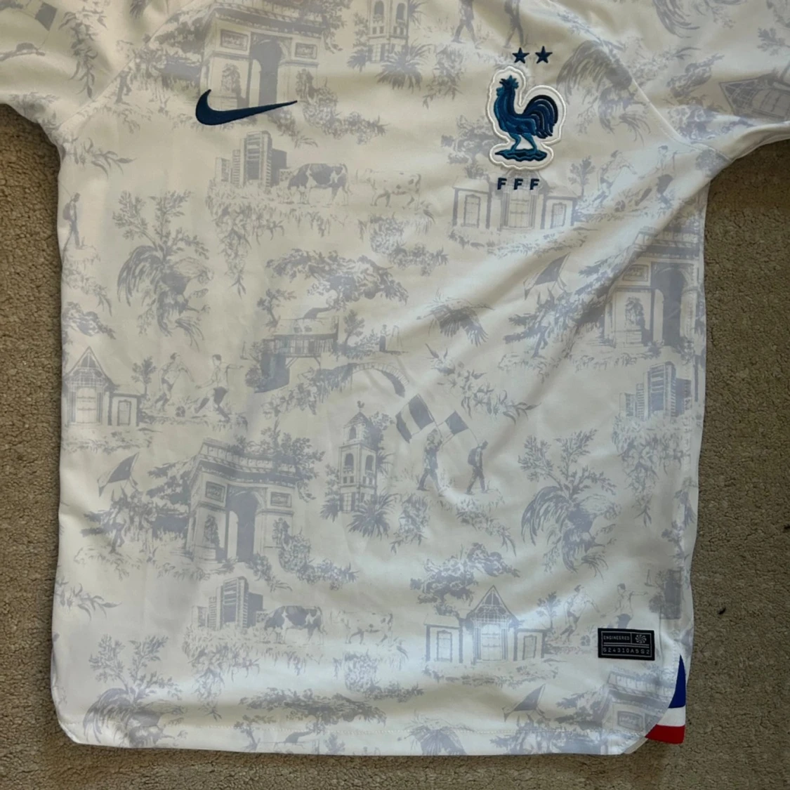 Frankrike Nike fotbollströja mönstrad