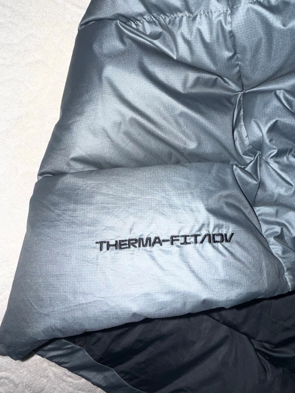 Svart lång pufferjacka från Nike - 6