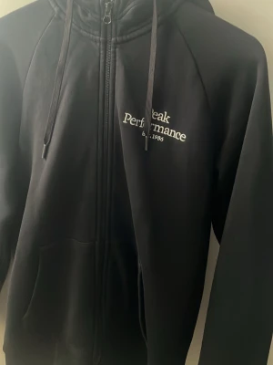 Svart  peak performance hoodie - Mycket bra