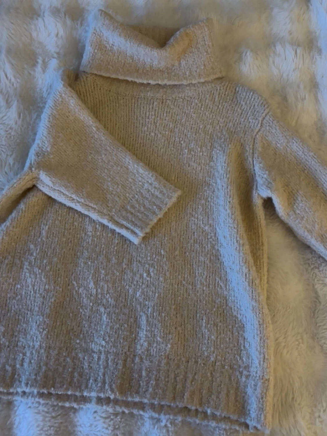 Beige polotröja från Indiska