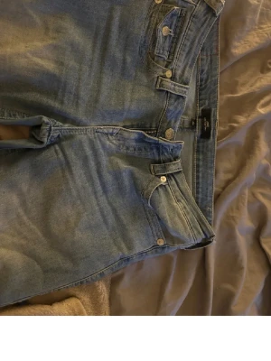 True Religion Jeans – Size 29 – Classic Light Wash - Authentic True Religion jeans in size 29. Classic light blue wash with the iconic True Religion back pocket stitching and logo button.  The jeans are in good condition with normal light wear, just some minimal wear at the bottom of the leg. Timeless style that works for both casual and dressed-up outfits. Comfortable fit and great quality denim, as True Religion is known for.  Perfect if you’re looking for stylish, high-quality designer jeans at a great price.💞