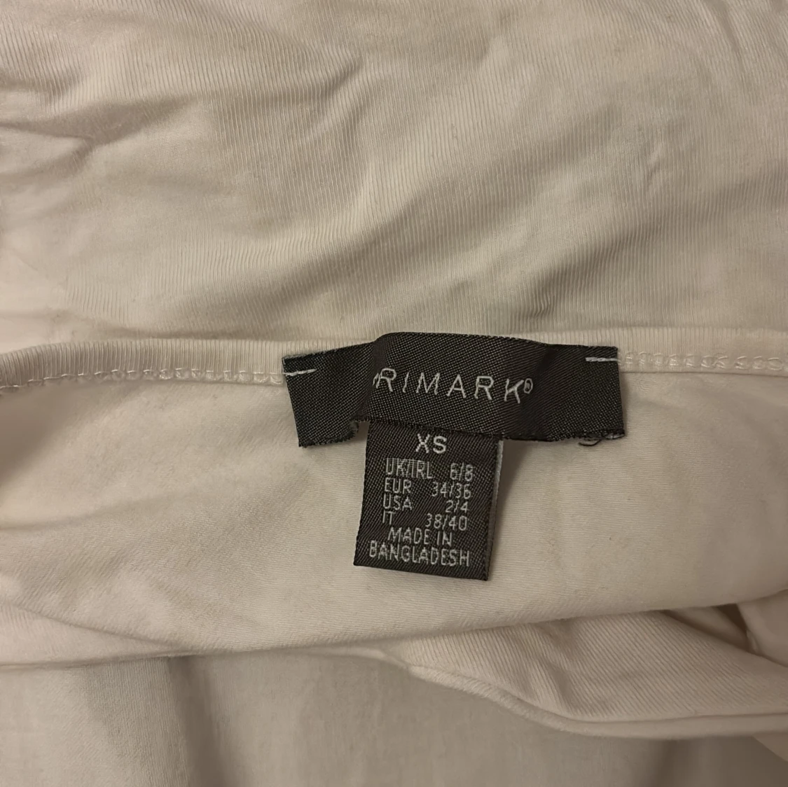 Vit oneshoulder topp från Primark XS - 2