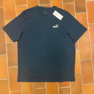 Puma Tshirt - Helt sprillans ny puma tshirt i storlek XL. Bra kvalité och skönt material.