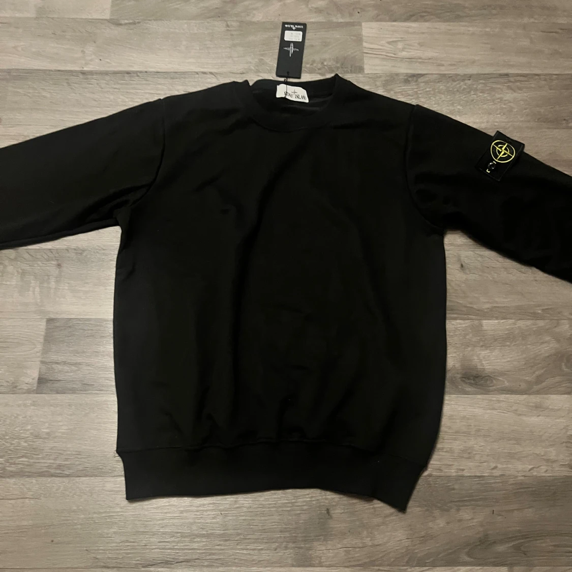 Svart sweatshirt från Stone Island