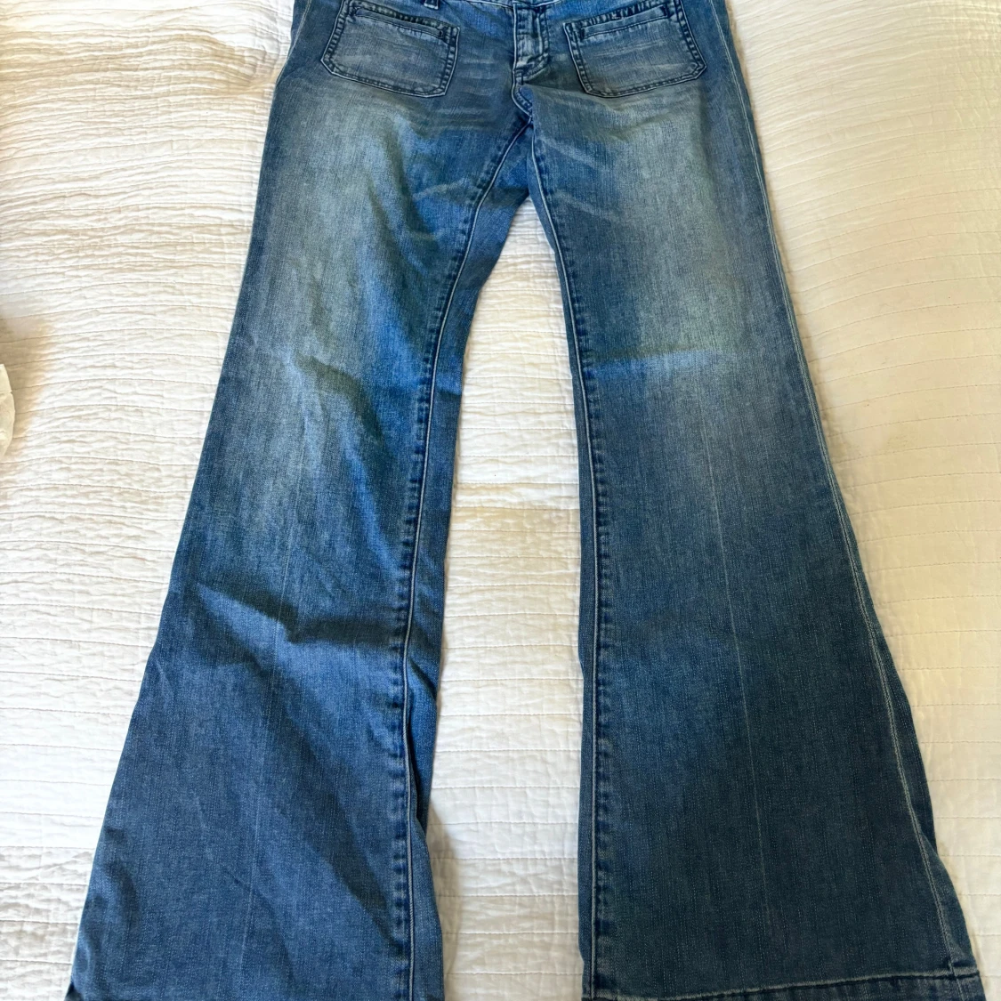 Blå bootcut jeans från Tommy Hilfiger - 1