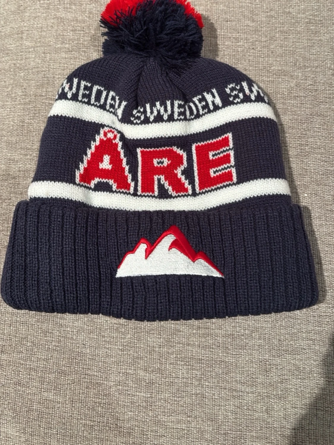 Mörkblå stickad Åre mössa med tofs - 1