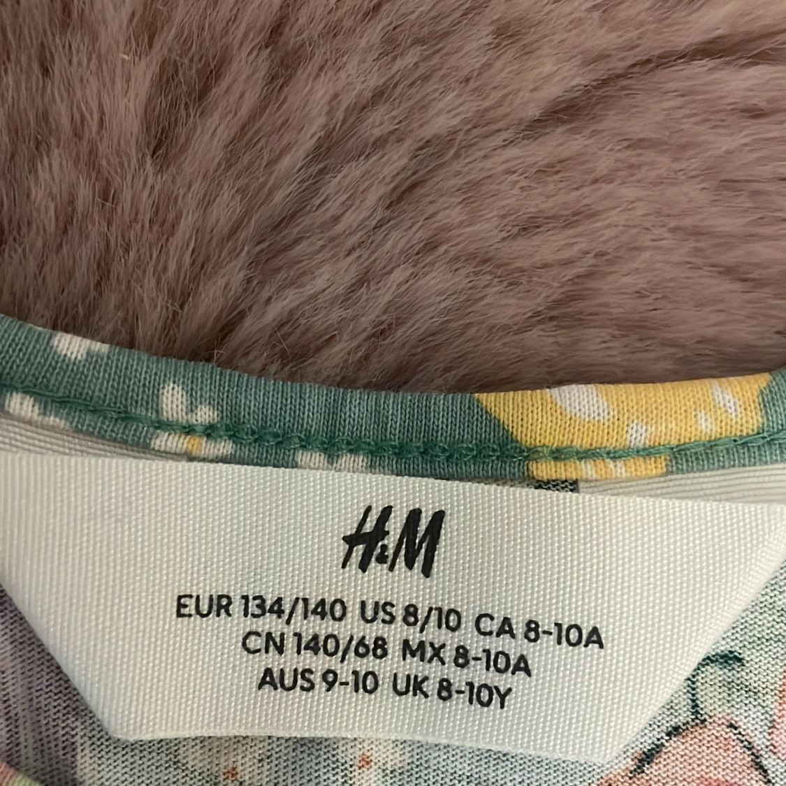Blommig ärmlös klänning H&M 134/140 - 1