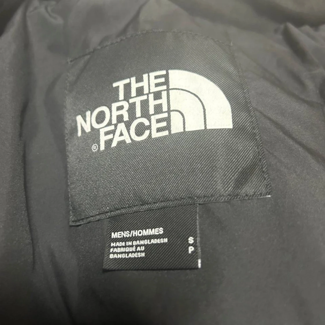 Svart dunväst från The North Face - 2