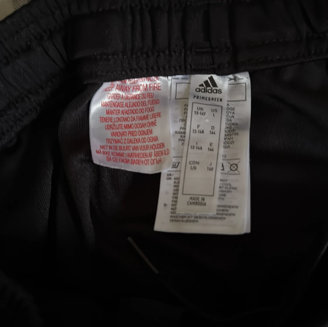 Svarta Adidas träningsbyxor med ränder - 2