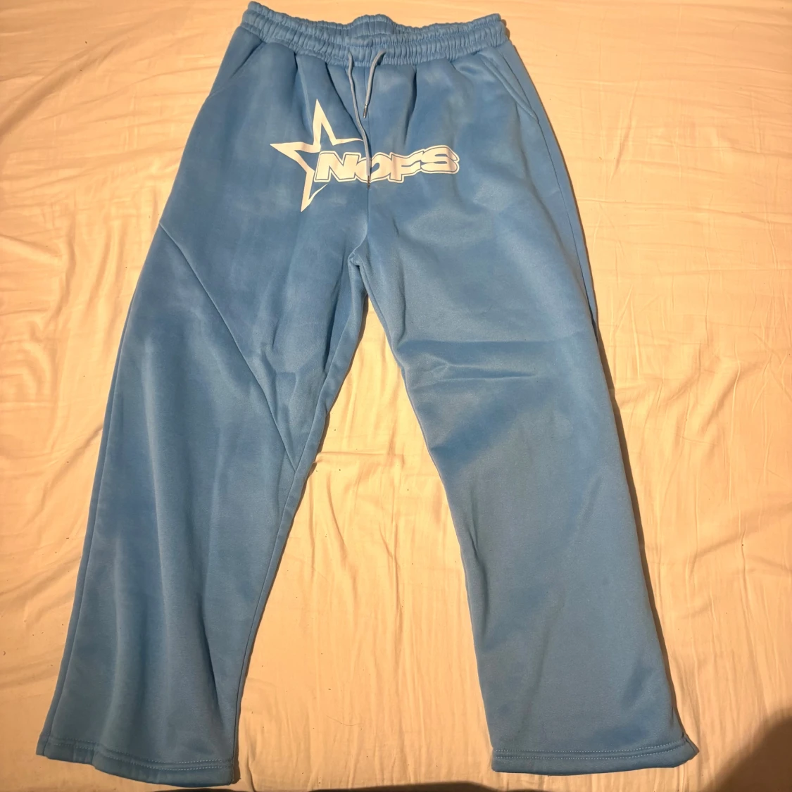 Blå hoodie och byxor från NOFS med stjärnlogo - 2
