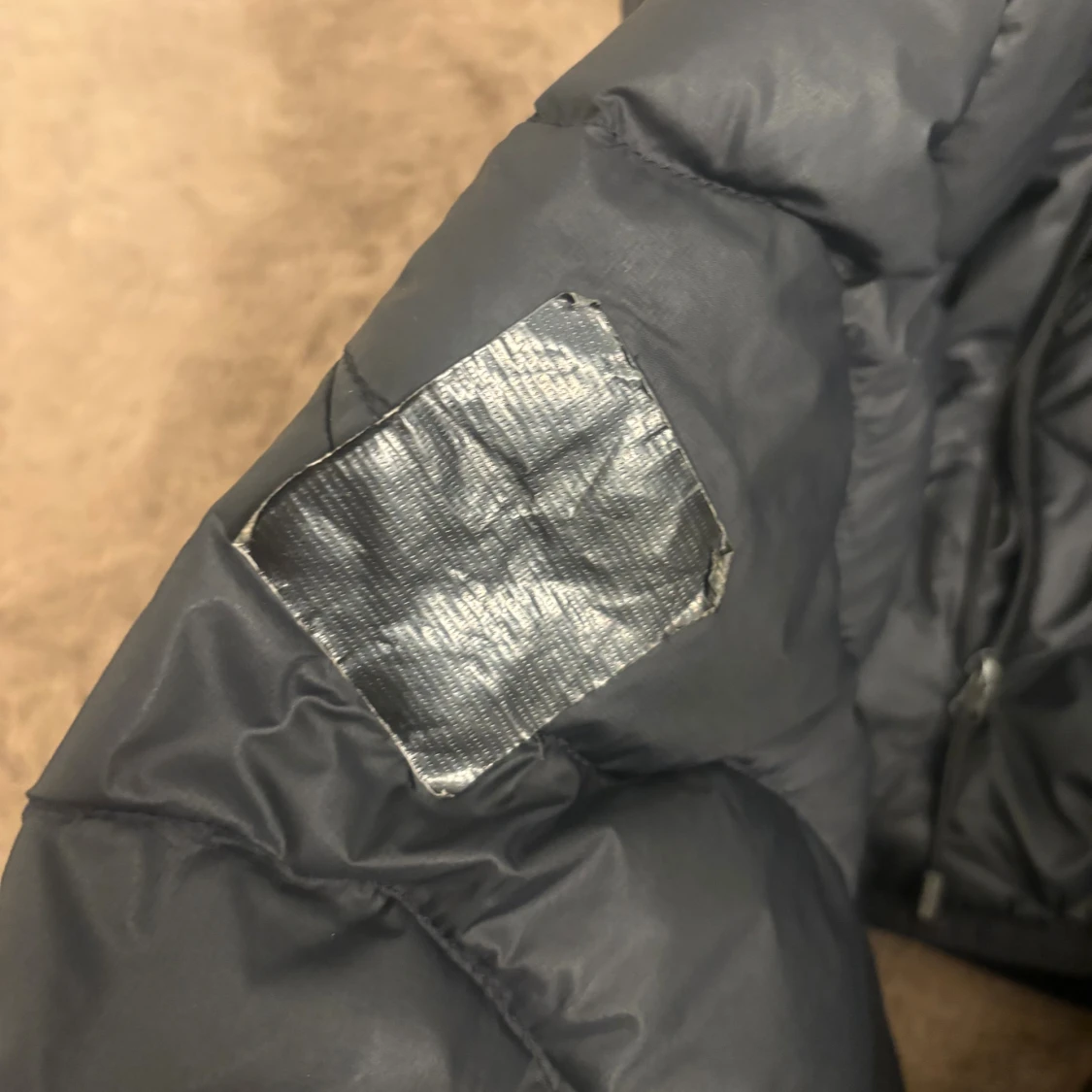 Svart Peak Performance dunjacka L - 3