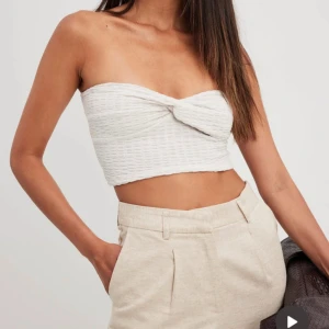 Tubtopp från NAKD - Beige tub top från NAKD i storlek L. Endast testad men utan prislapp. Mycket bra skick.