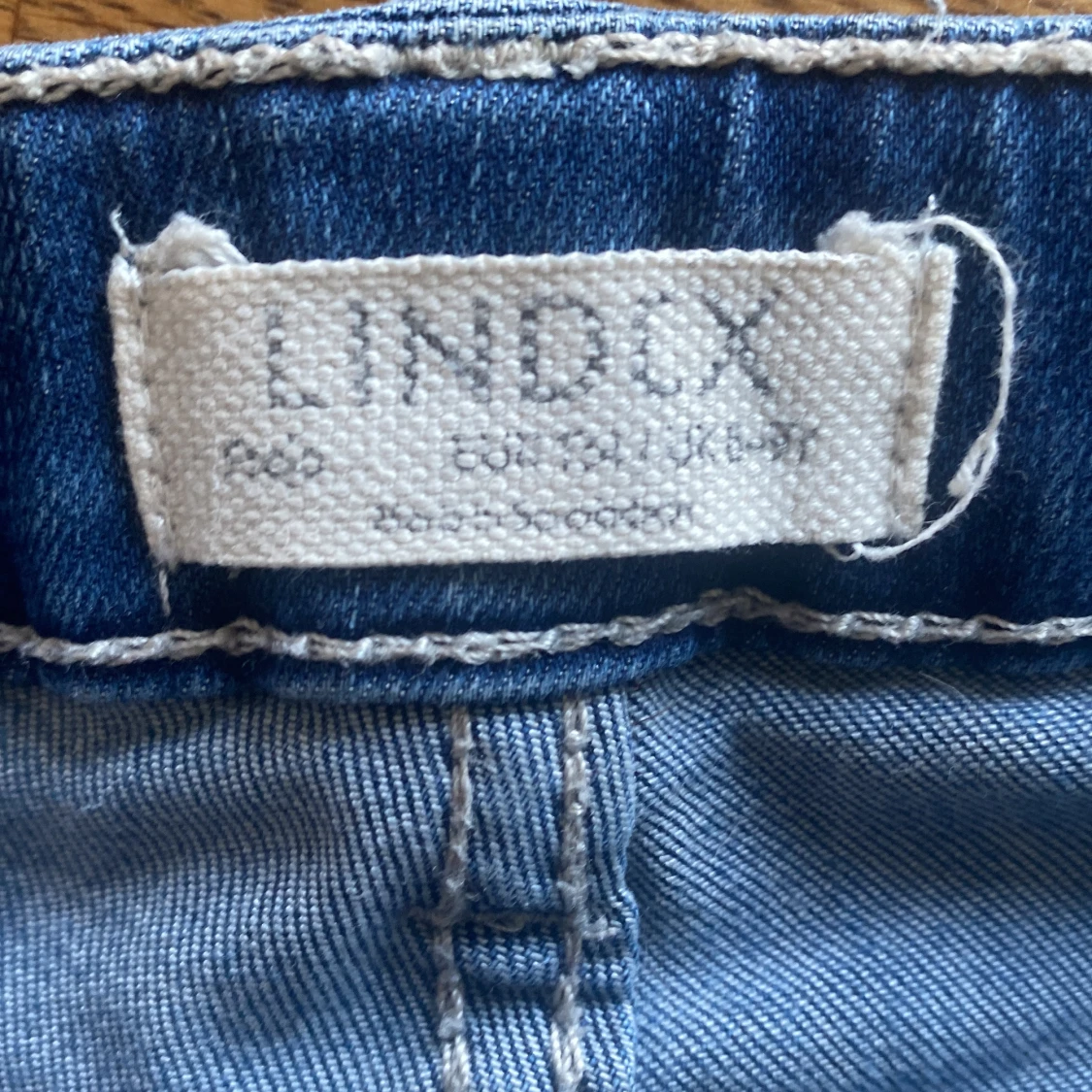 Blå bootcut jeans från Lindex - 2