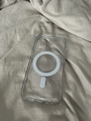 Telefonskal - Den går tyvärr inte allt ladda med en laddplatta köpt på clas olson 