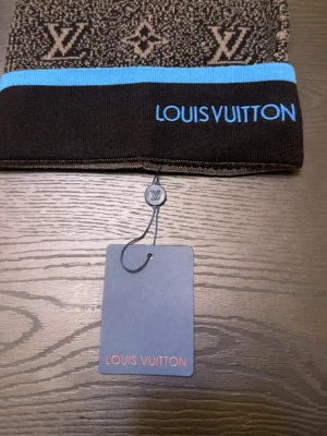 L mössa med tags - L mössa med tags