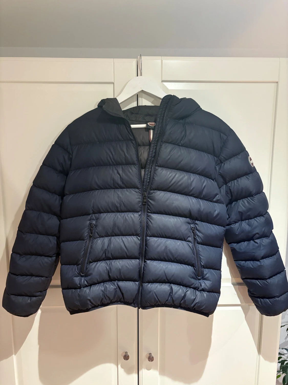 Mörkblå Colmar pufferjacka med huva
