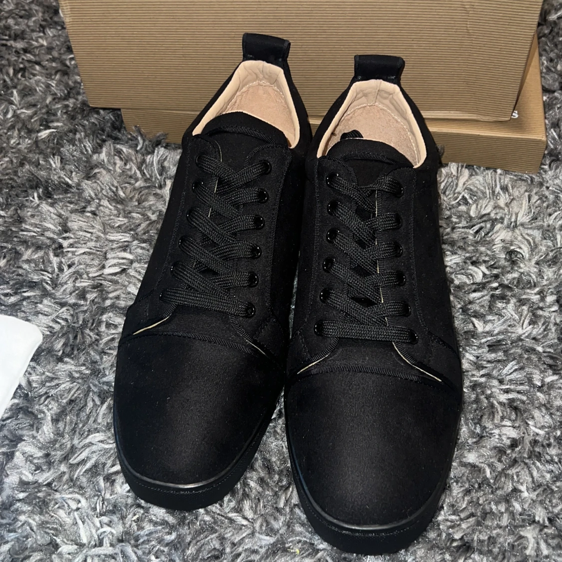 Svarta sneakers från Christian Louboutin