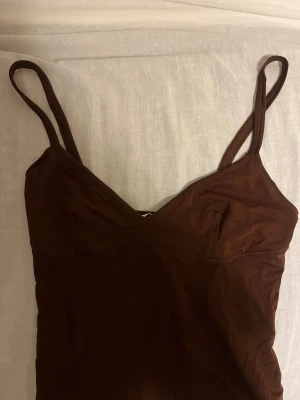 Zara populär linne - Brun. Använd en gång. Populär och säljs inte längre. Passar både S och M