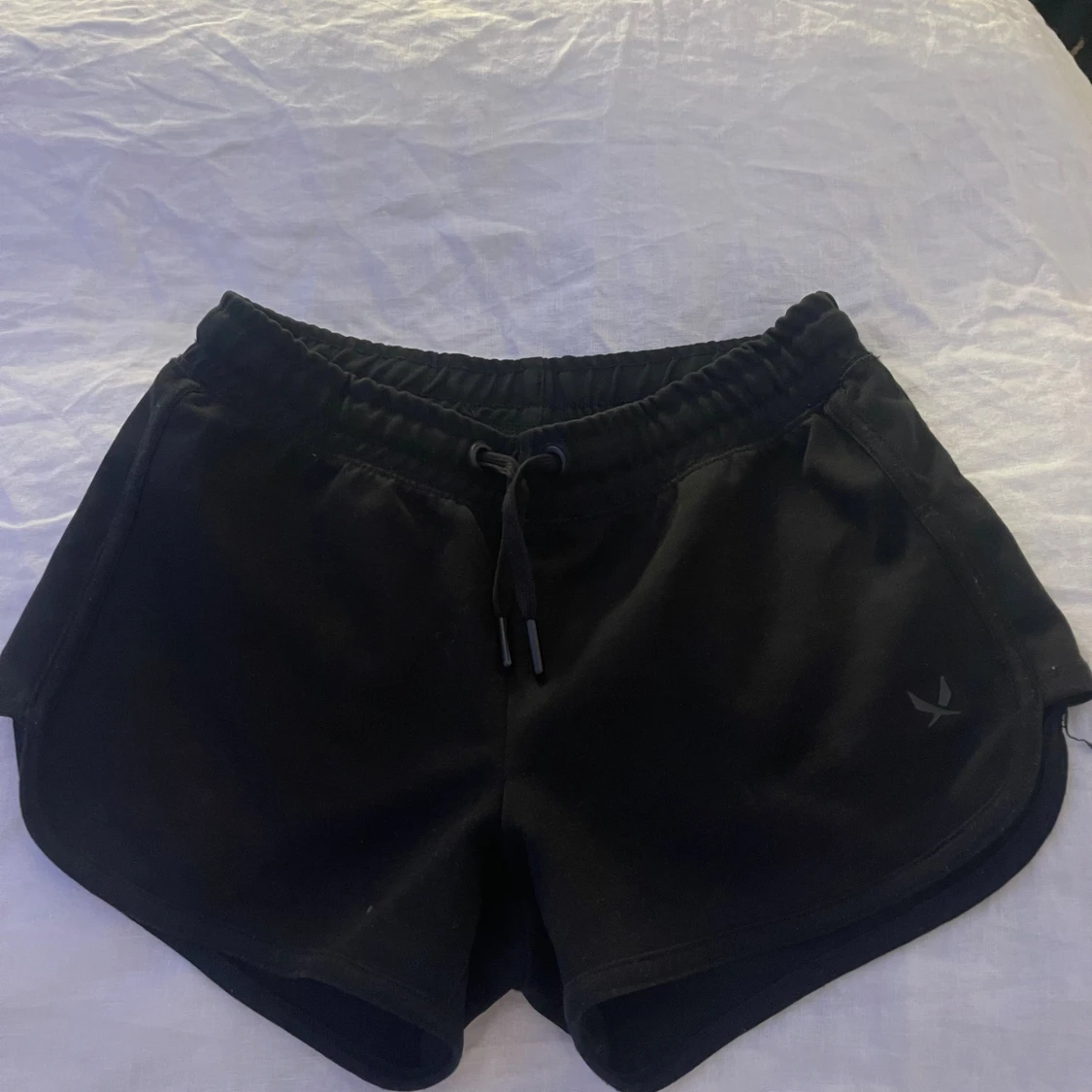 Svarta träningsshorts med snörning