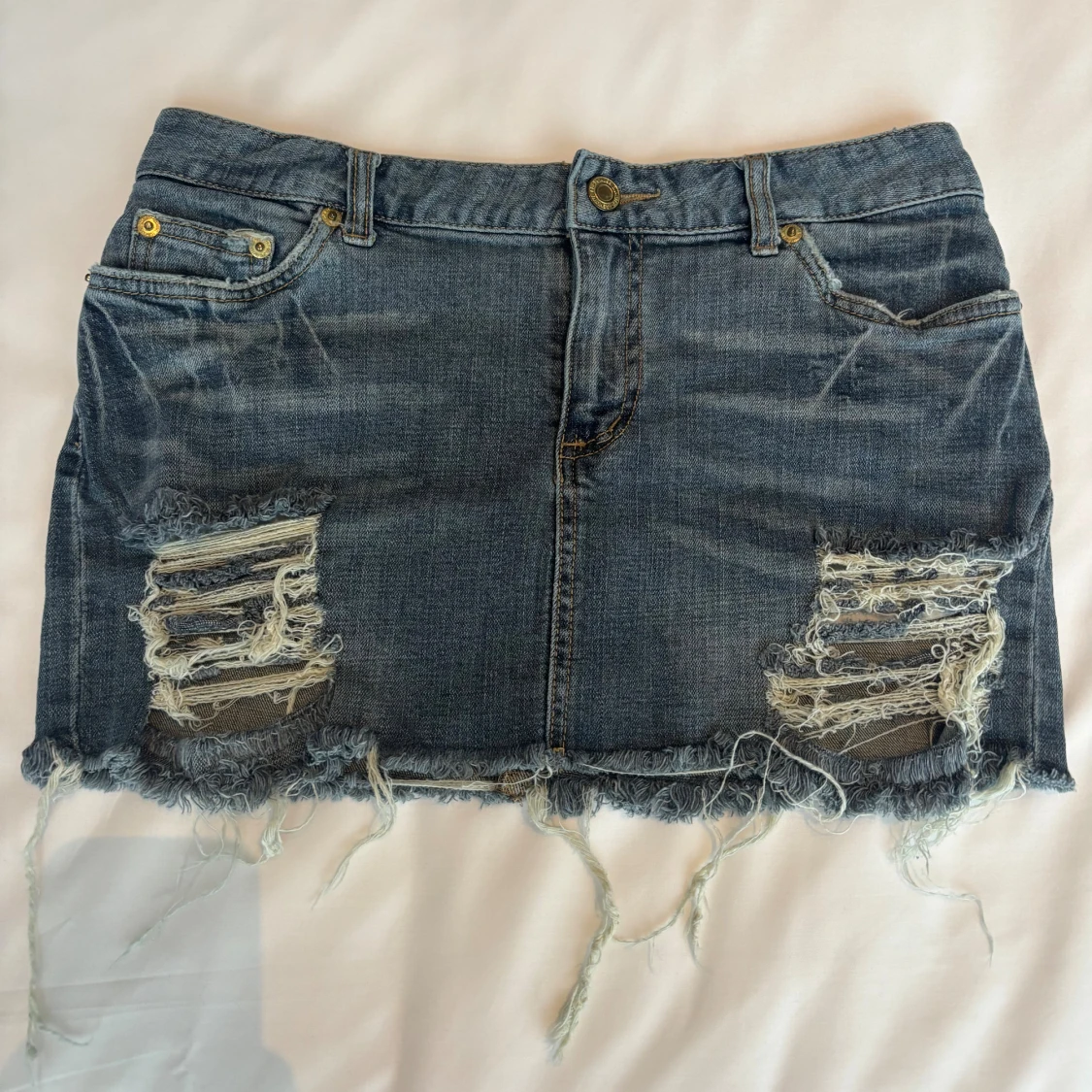 Blå jeanskjol med slitningar Coloring-gem