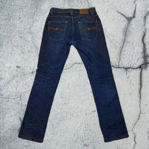 Nudie dry grim Tim jeans  - | Säljer nu ett par feta nudies med en majs påbörjad wash | Storlek: 31/34 | De är i färgmodellen ”dry” vilken gör att de fungerar som selvedge jeans och blir snyggare med tiden | skriv för fler frågor och bilder ;)|