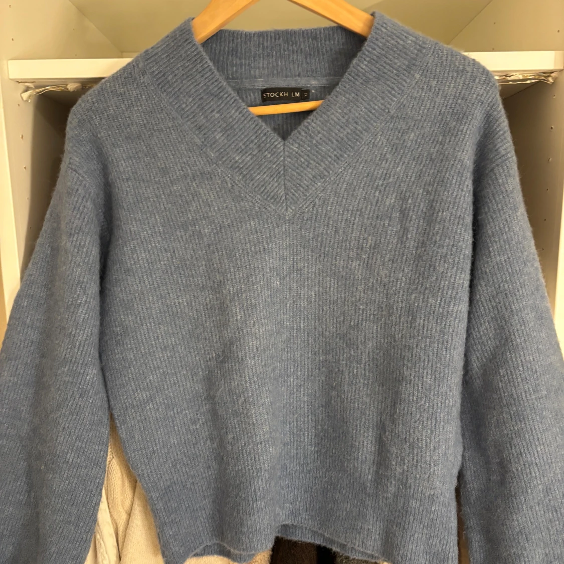 Blå stickad tröja från Stockh LM - 1