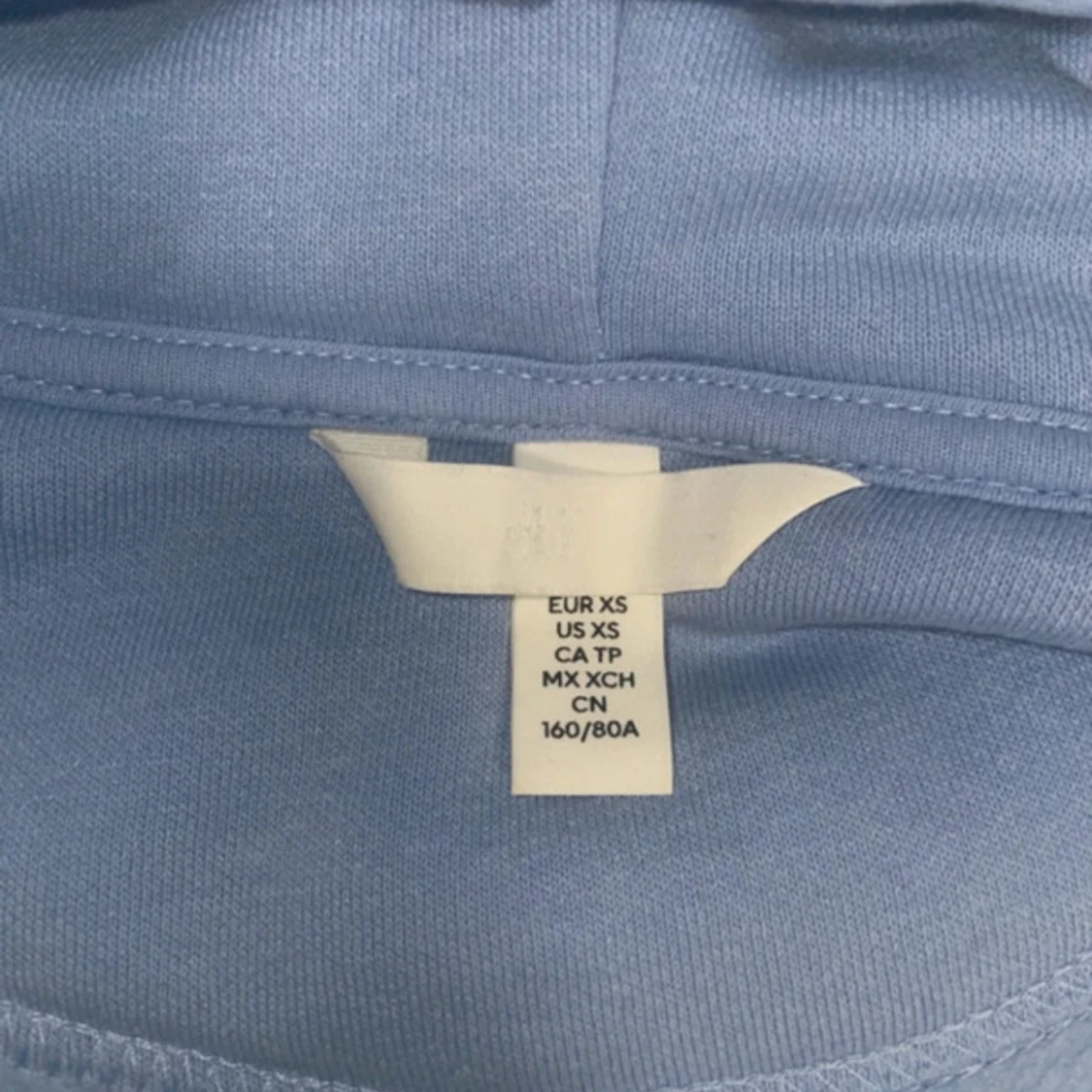 Ljusblå hoodie med dragkedja från H&M - 2