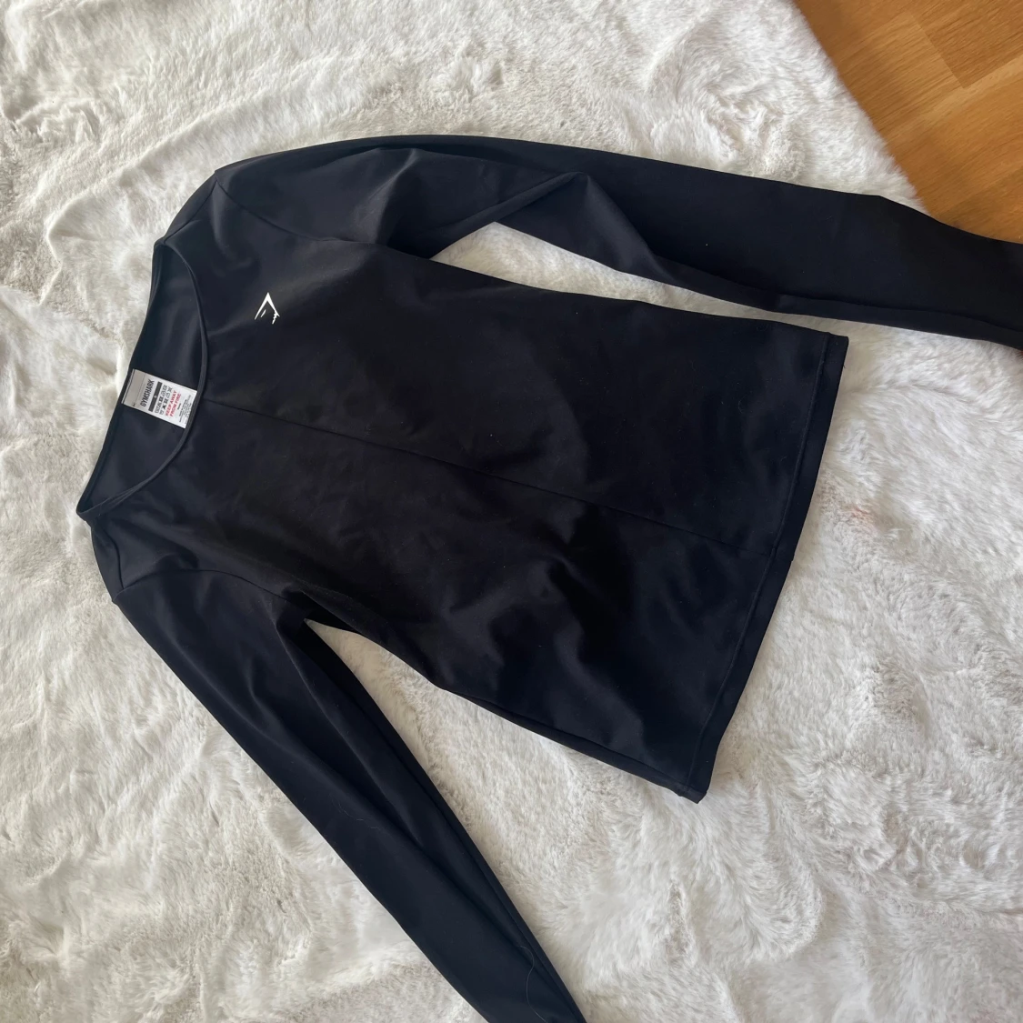 Svart långärmad topp med öppen rygg - 2