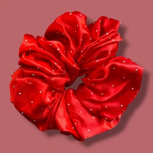 Ruby Maxi Satin Scrunchie – Oversized Hair Tie - Adds a bold, elegant red pop of color to any hairstyle. Strong yet gentle, this scrunchie holds hair securely while reducing breakage.  🎨 Color: Ruby (rich, jewel-toned red) 📏 Size:  One size / oversized (Perfect for thick or long hair, and for anyone who enjoys beautiful hairstyles.) ✨ Material: Satin (soft, smooth, and gentle on hair)