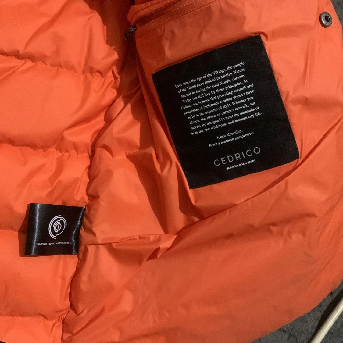Orange dunväst från Cedrico - 2