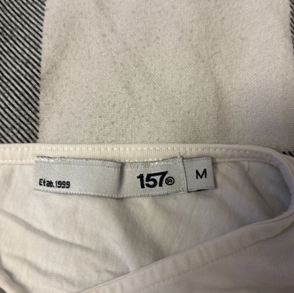 Vit ärmlös linnetopp från 157 - 2