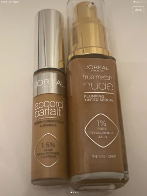 L'Oréal foundation & concealer duo - Säljer två sminkprodukter från L'Oréal Paris: True Match Nude Plumping Tinted Serum i färgen 7-8 Tan Deep med 1% hyaluronsyra och Accord Parfait Serum Correcteur Lumineux concealer med 1,5% hyaluronsyra och koffein. Båda har en varm, djup brun ton och kommer i glasflaska och plasttub.