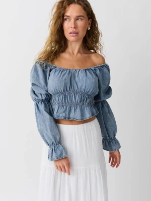 Jeans topp med puffärmar - Nyskick med prislappen kvar nypris var 399kr.